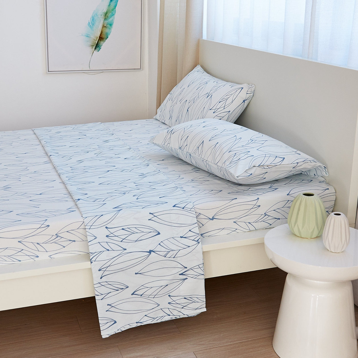 Side View of Modern Foliage Sheet Set in White and Blue#color_modern-foliage-white-and-blue