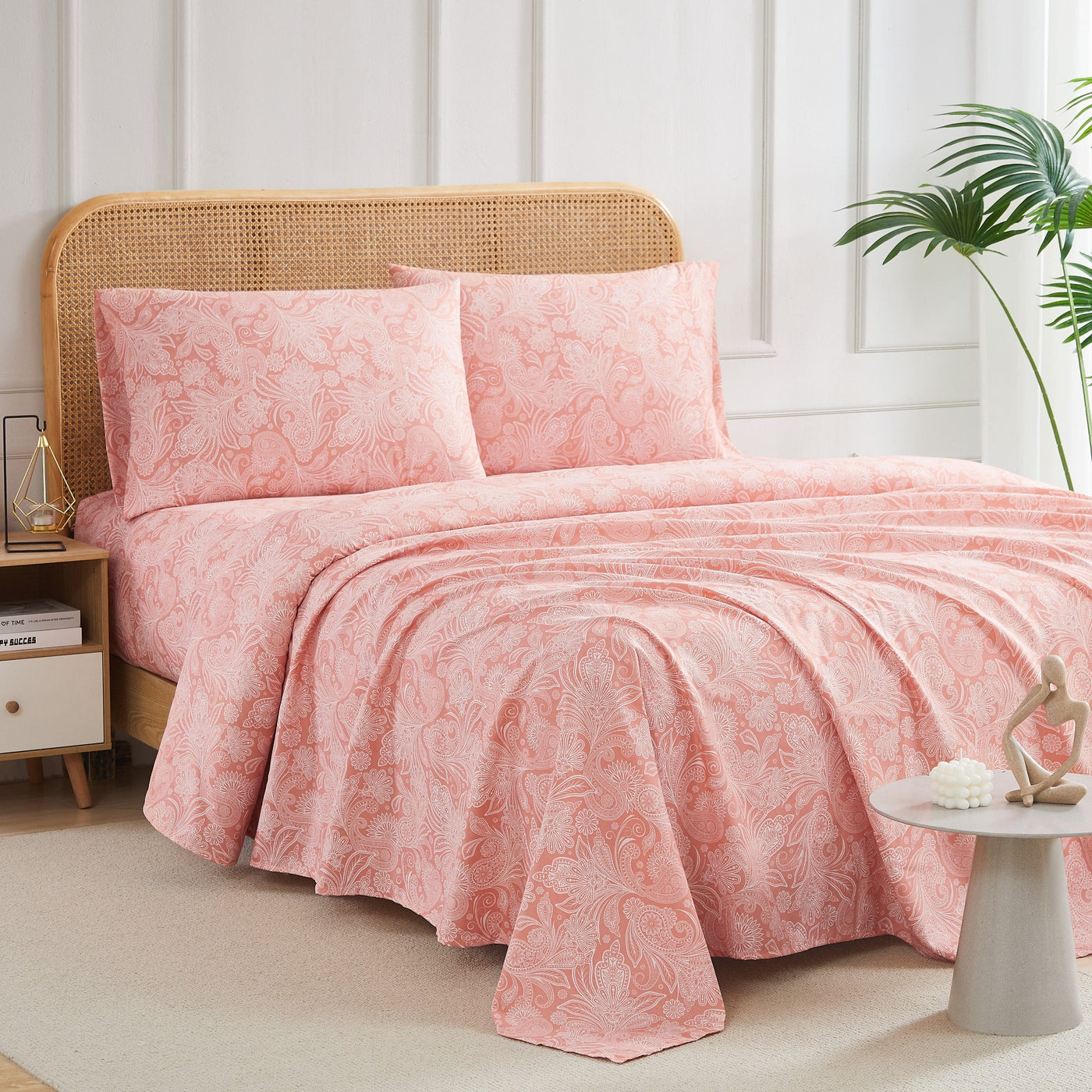 Angled View of Perfect Paisley Sheet Set in Coral#color_perfect-paisley-coral-haze-with-white