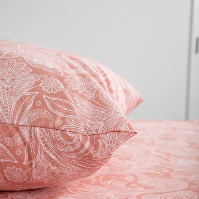 Close Up Image of Perfect Paisley Sheet Set in Coral Pillow Shams#color_perfect-paisley-coral-haze-with-white