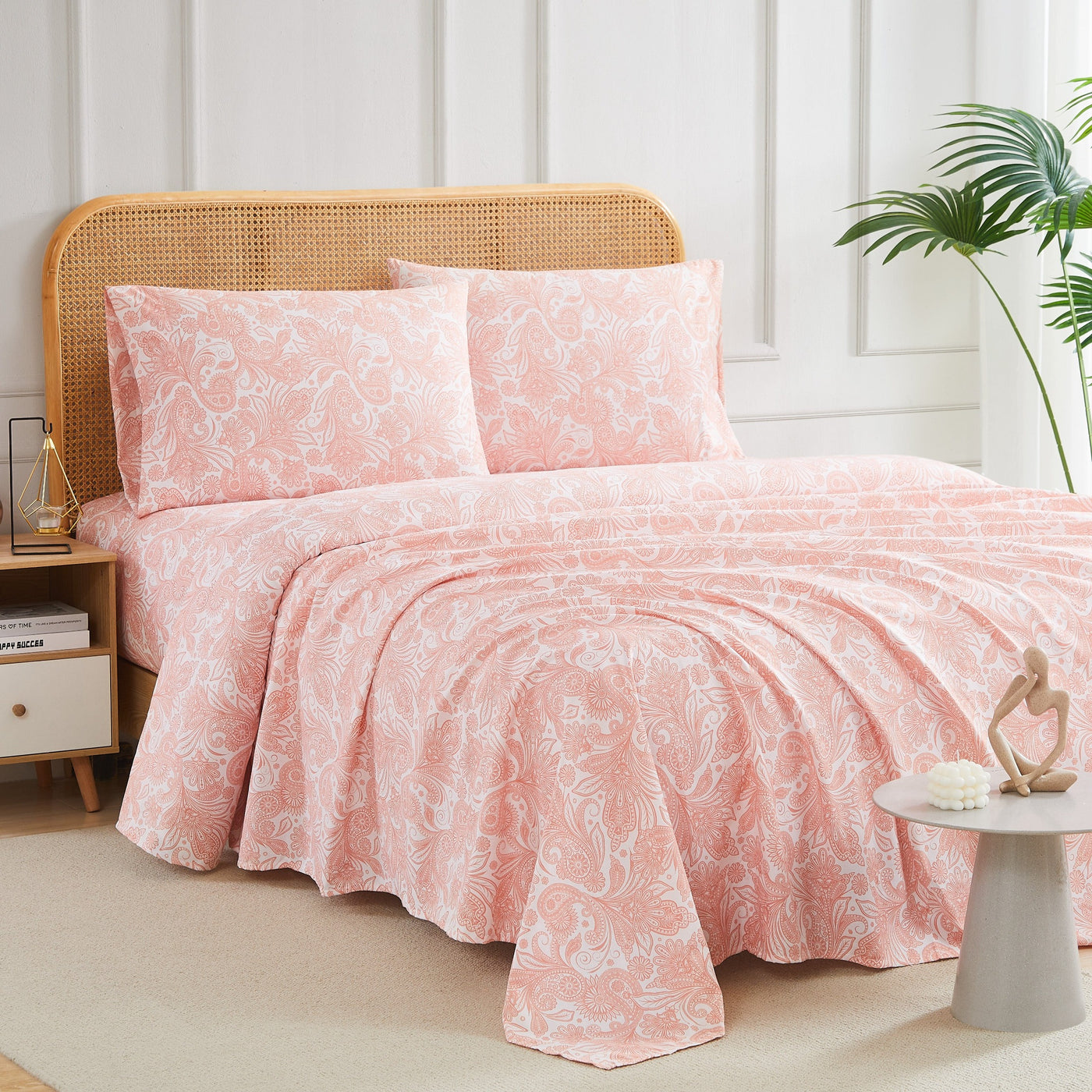 Angled View of Perfect Paisley Sheet Set in Coral#color_perfect-paisley-white-with-coral-haze
