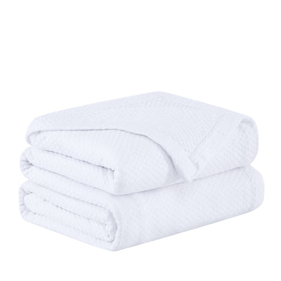 Folded Milton Cotton Blankets and Throws in White#color_milton-white