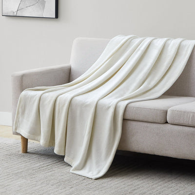 Microfleece Oversized Blankets and Throws in Cream on Sofa#color_microfleece-cream