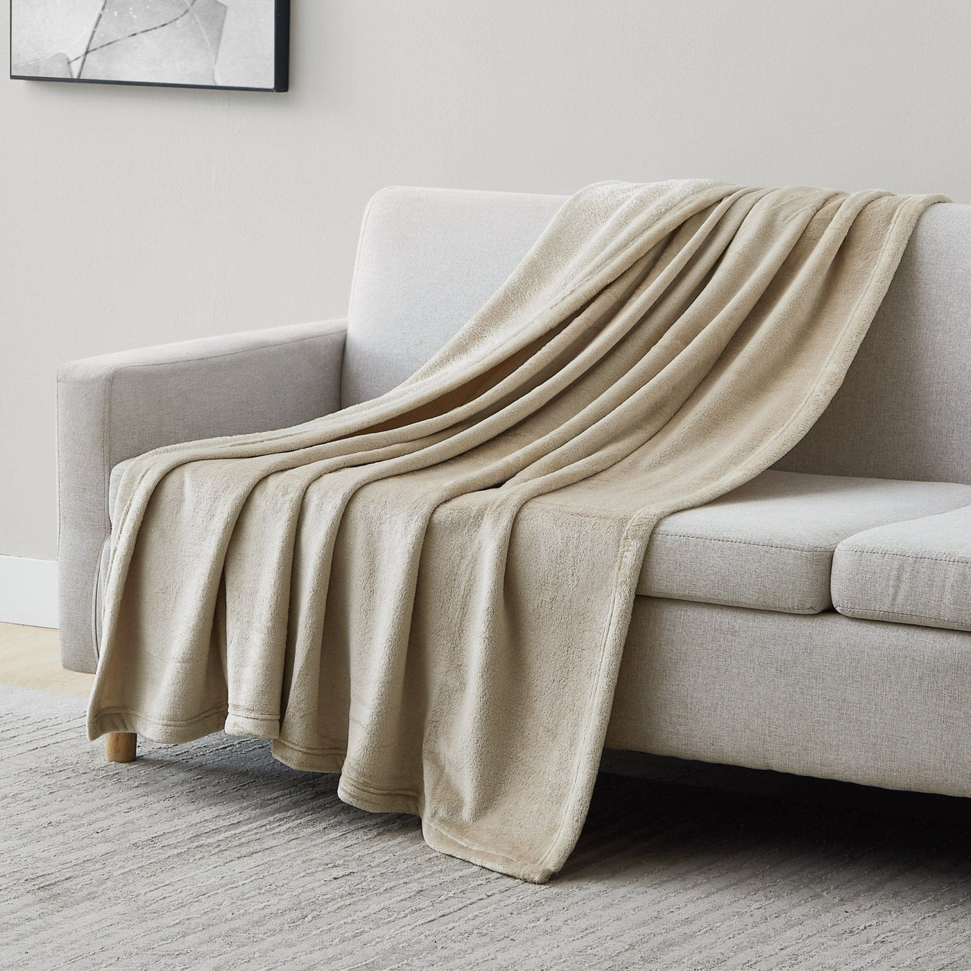 Microfleece Oversized Blankets and Throws in Sand on Sofa#color_microfleece-sand