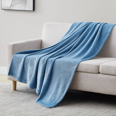 Microfleece Oversized Blankets and Throws in Blue on Sofa#color_microfleece-blue