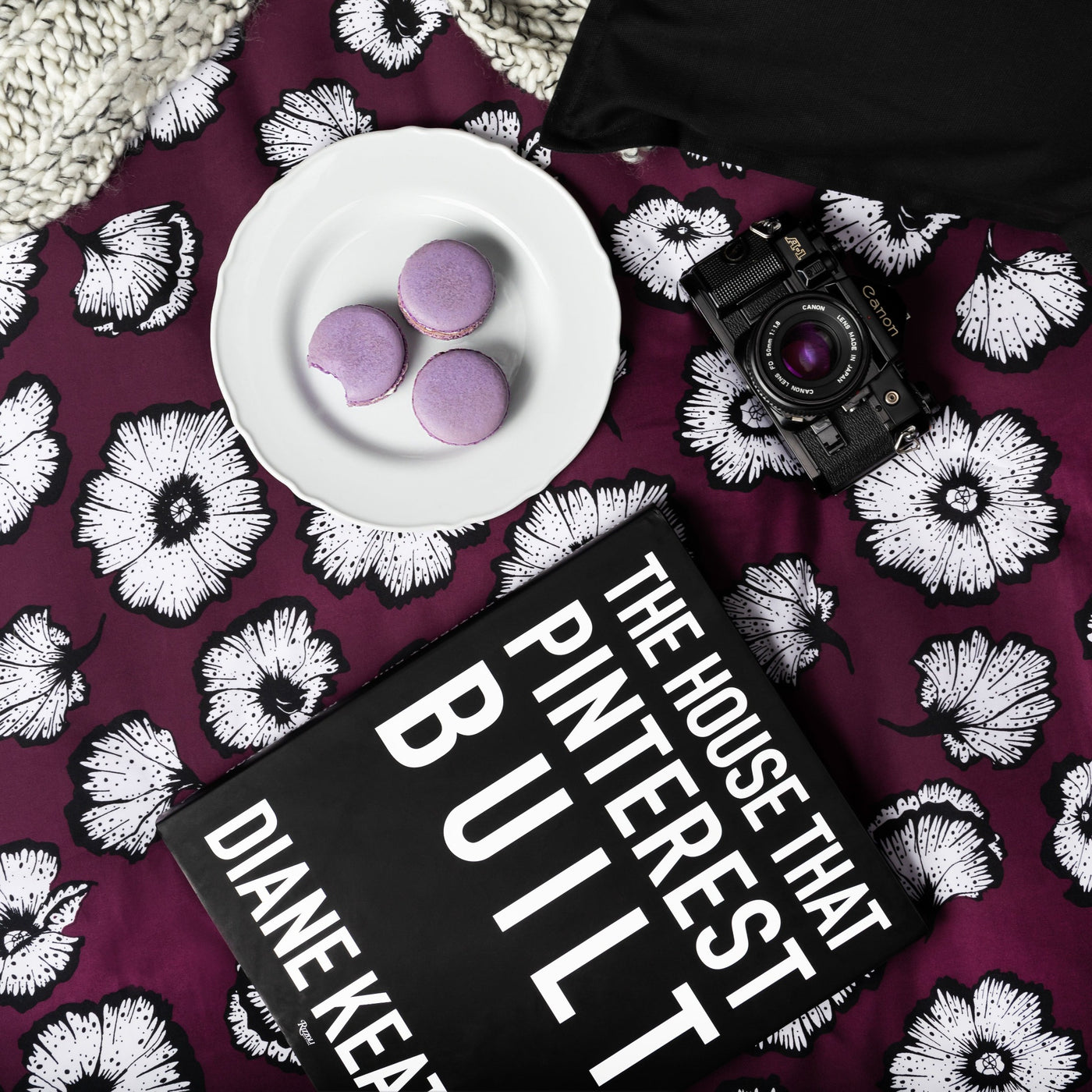 Magazine, camera and purple macaroons on top a Essence Duvet Cover Set in Purple#color_essence-purple