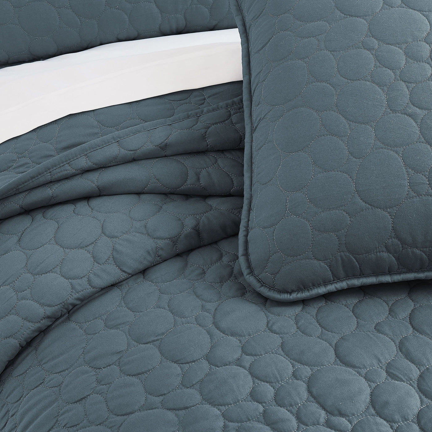Details and Texture of Pebbles Oversized Quilt Set in Blue Mirage#color_pebbles-blue-mirage