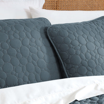 Close Up Image of Pebbles Oversized Quilt Set in Blue Mirage Pillow Shams#color_pebbles-blue-mirage