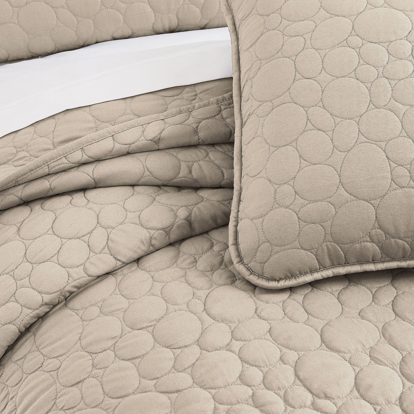 Details and Texture of Pebbles Oversized Quilt Set in Taupe#color_pebbles-taupe