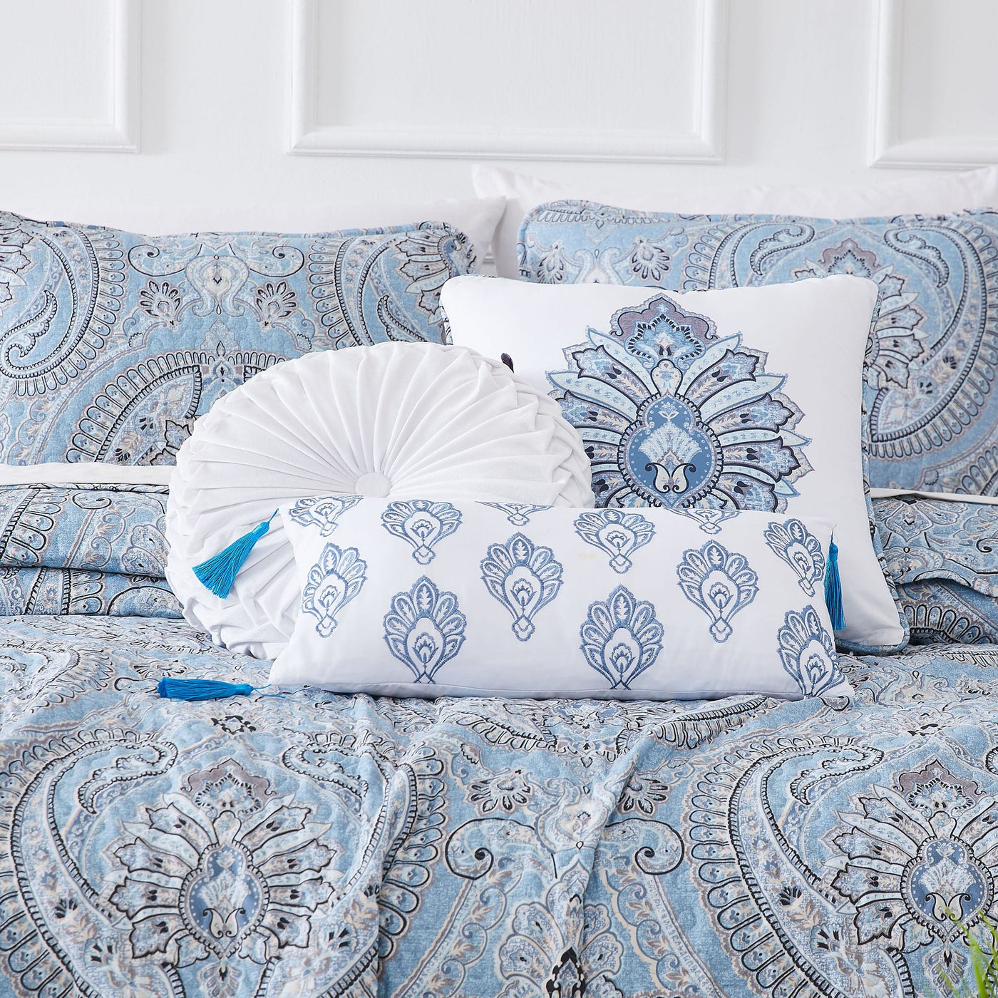 Close Up Image of Pure Melody 6-Piece Quilt Bedding Set in Aqua Pillow Shams and Throw Pillows#color_pure-melody-aqua