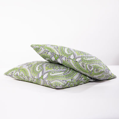 Pure Melody Quilted Sham Covers in Green on Bed#color_pure-melody-green