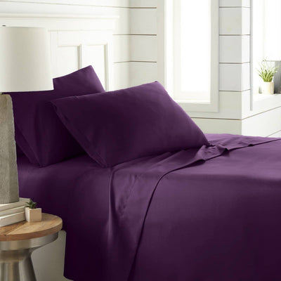 Angled View of Southshore Essentials 4-Piece Sheet Set in Purple#color_purple