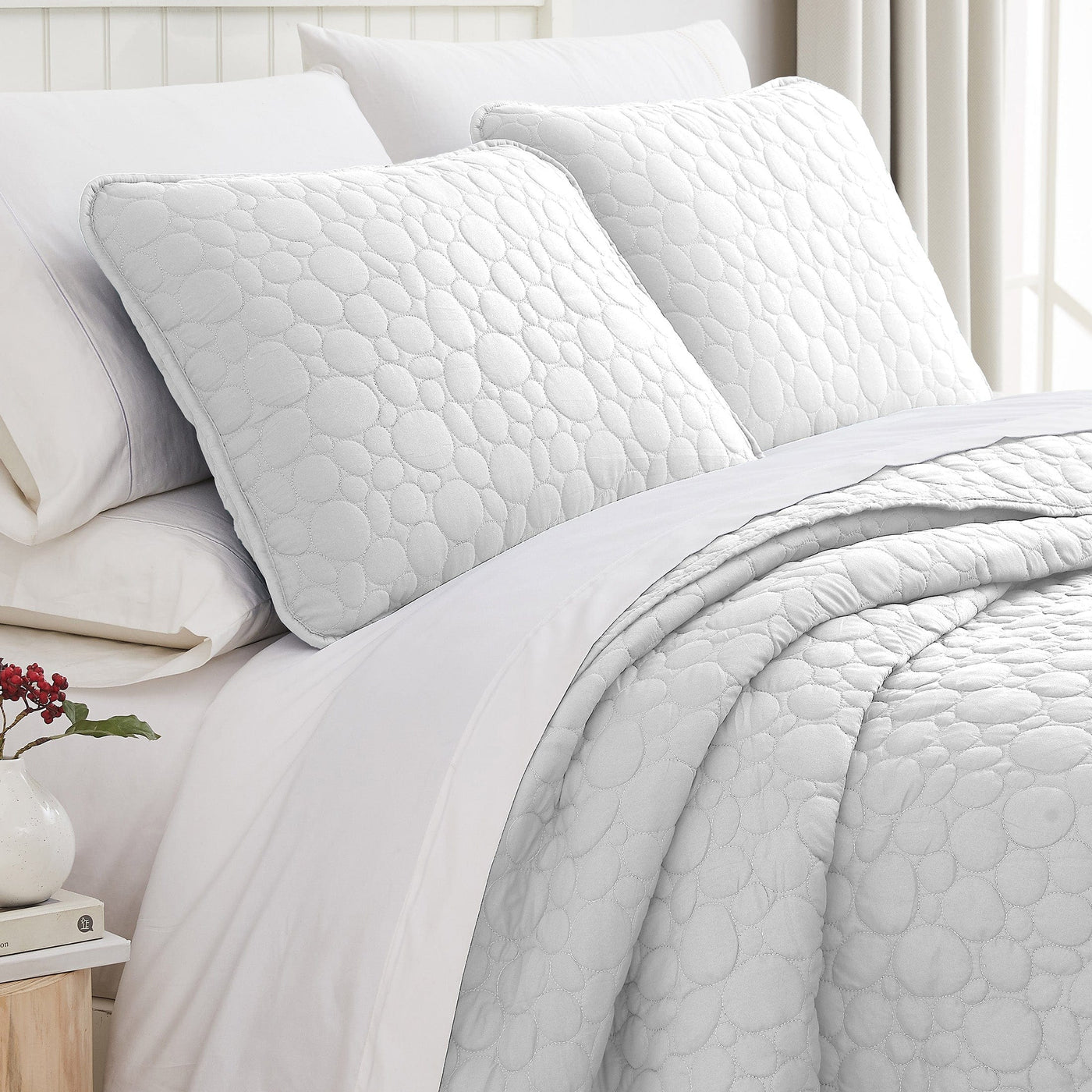 Angled View of Pebbles Oversized Quilt Set in White#color_pebble-white