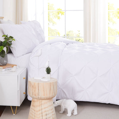 Side View of Pintuck Pinch Pleated Duvet Cover Set in White#color_vilano-bright-white