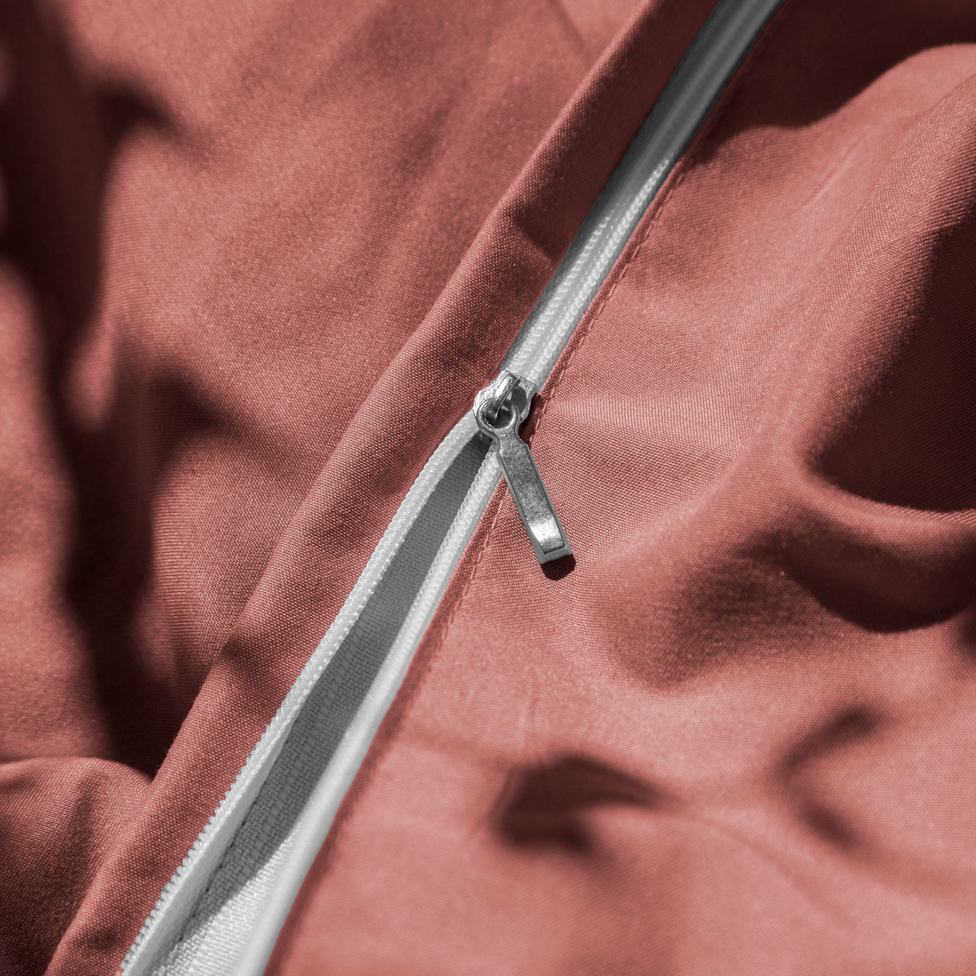 Close Up Image of Zipper Enclosure of Vilano Duvet Cover Set in Marsala#color_vilano-marsala