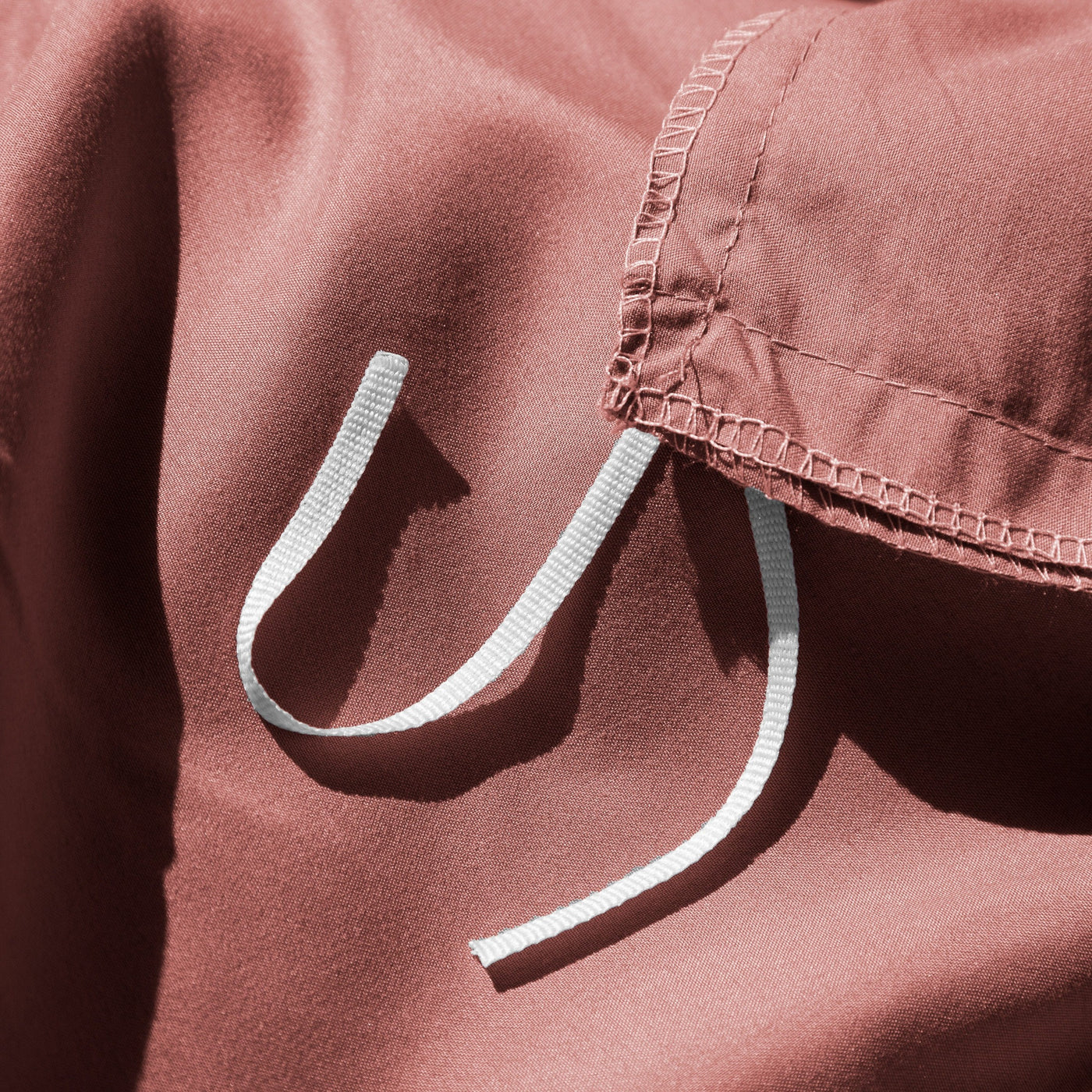 Close Up Image of Corner Ties of Vilano Duvet Cover Set in Marsala#color_vilano-marsala