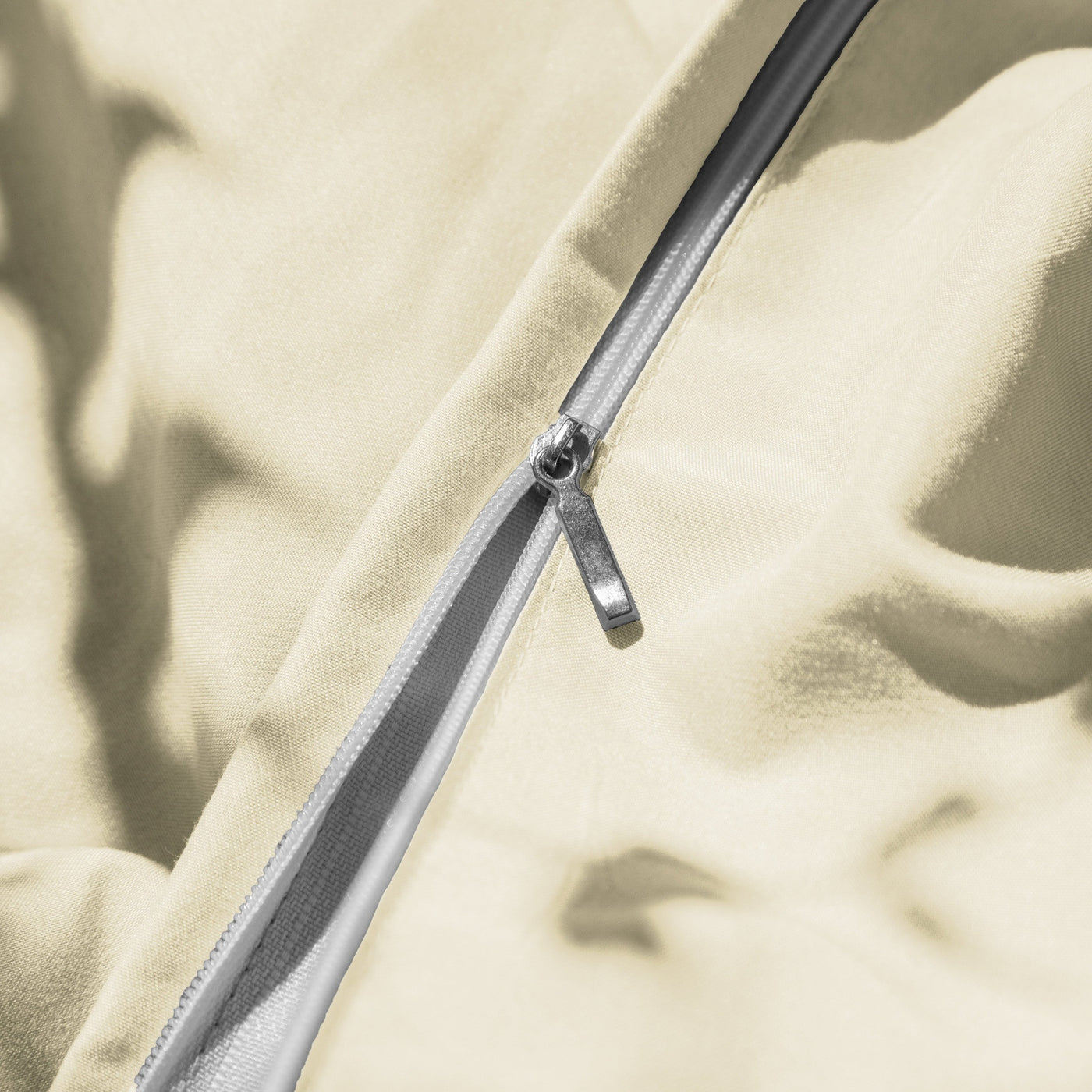 Close Up Image of Zipper Enclosure of Vilano Duvet Cover Set in Off White#color_vilano-off-white