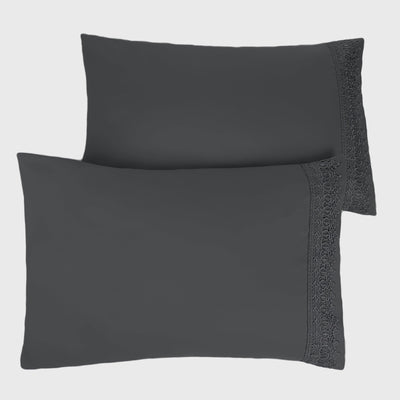 Two Vilano Lace Hem Pillow Cases in Slate Stack Together#color_vilano-slate
