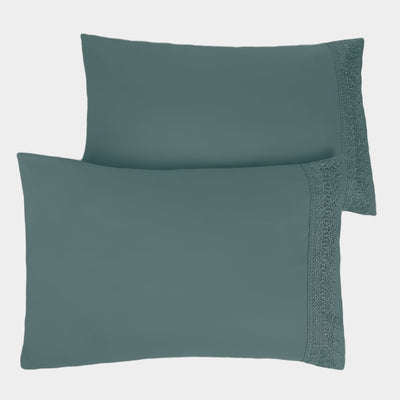 Two Vilano Lace Hem Pillow Cases in Steel Blue Stack Together#color_vilano-steel-blue