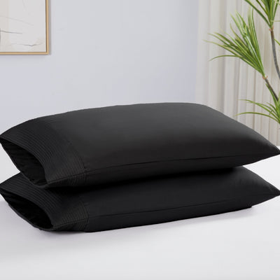 Two Vilano Pleated Pillow Cases in Black Stack Together#color_vilano-black