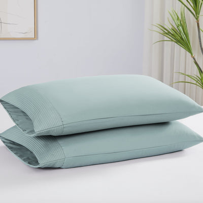 Two Vilano Pleated Pillow Cases in Sky Blue Stack Together#color_vilano-sky-blue