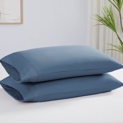 Two Vilano Pleated Pillow Cases in Coronet Blue Stack Together#color_vilano-coronet-blue