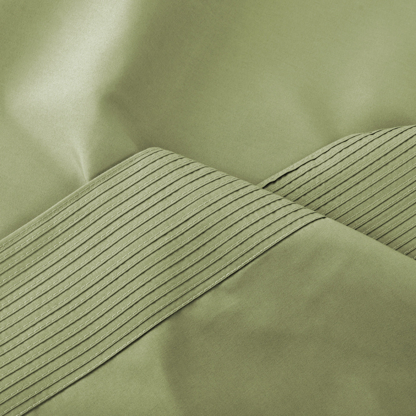 Details of Elegant Pleated Hem of Vilano in Sage Green#color_vilano-sage-green