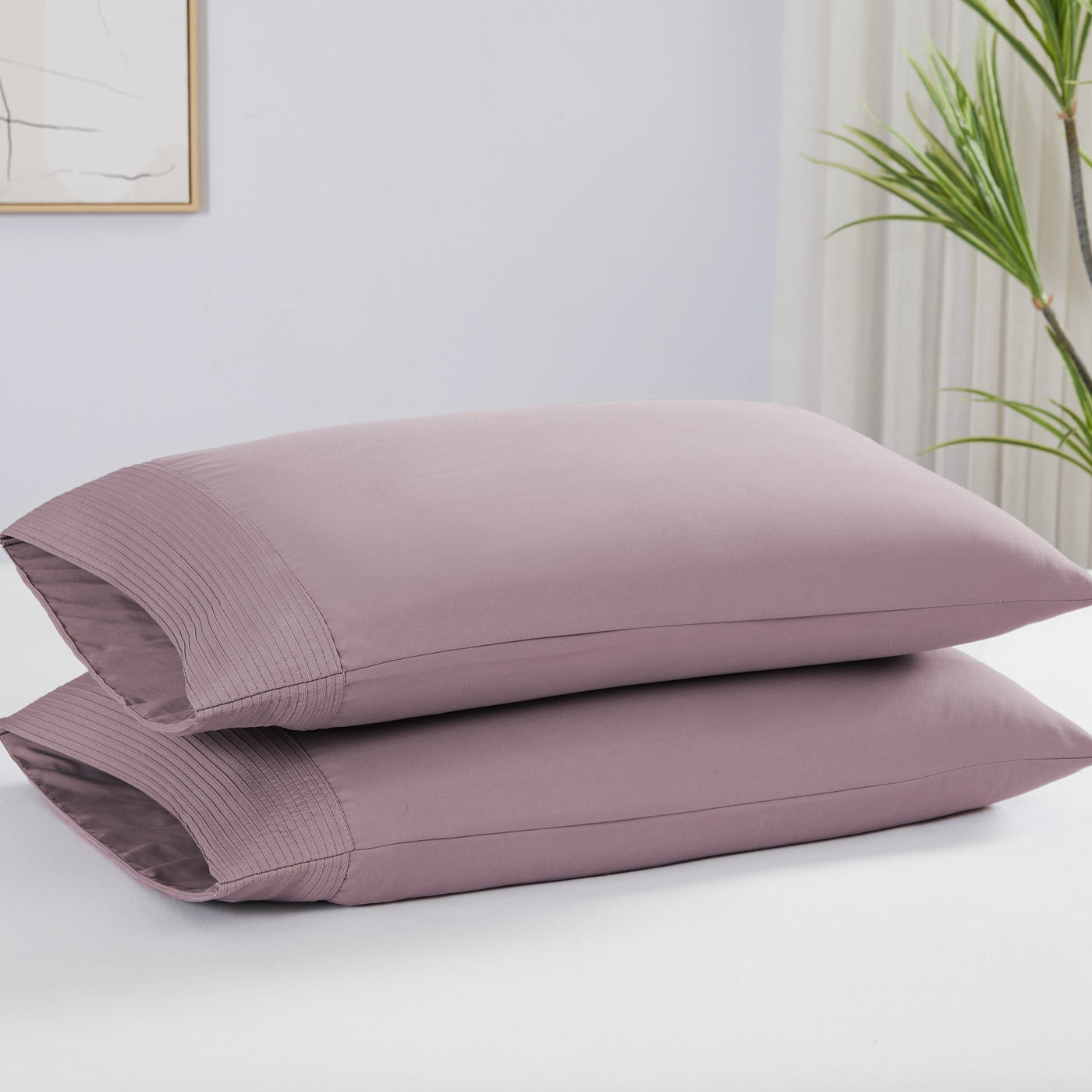 Two Vilano Pleated Pillow Cases in Lavender Stack Together#color_vilano-lavender
