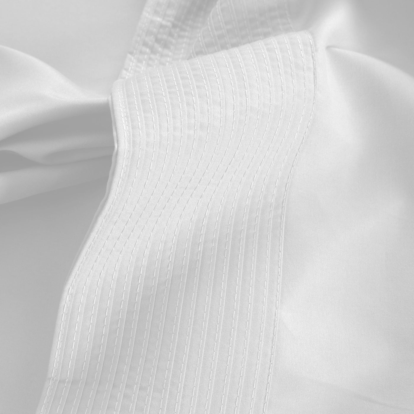 Details of Elegant Pleated Hem of Vilano in White#color_vilano-bright-white