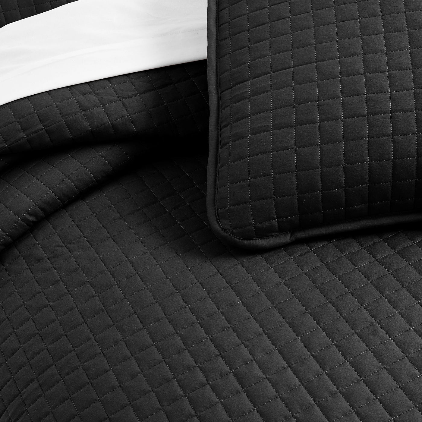 Details and Texture of Vilano Oversized Quilt Set in Black#color_vilano-black