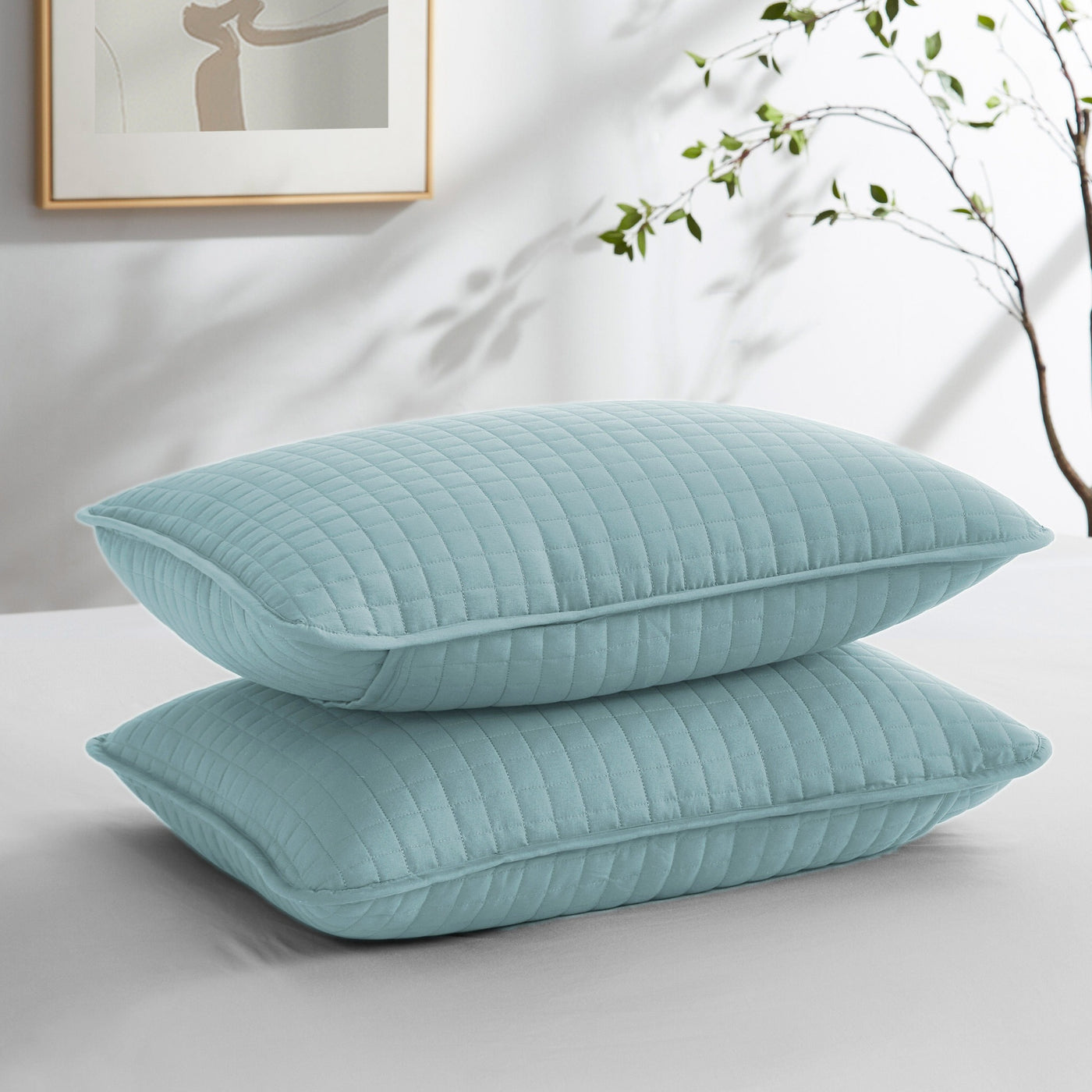 Two Vilano Quilted Shams in Sky Blue Stack Together#color_vilano-sky-blue