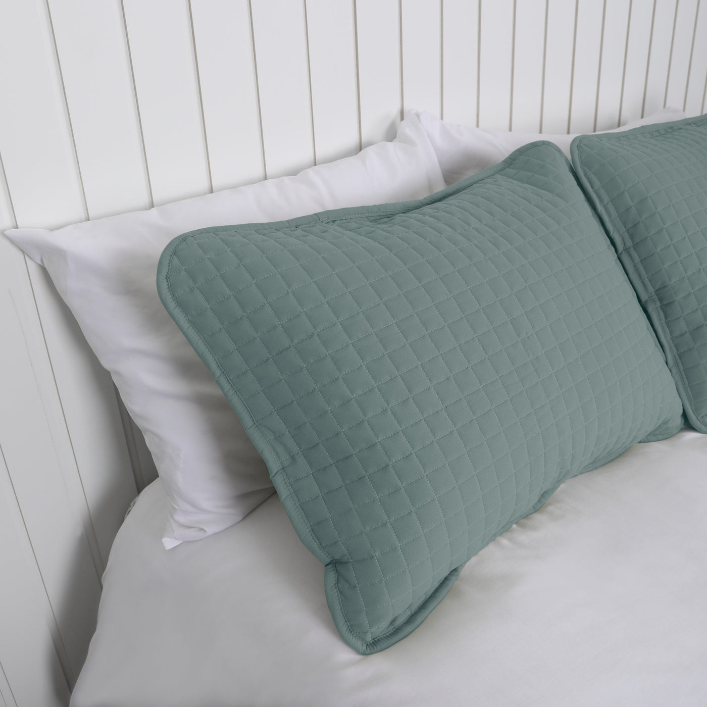Side View of Vilano Quilted Sham and Pillow Covers in Steel Blue#color_vilano-steel-blue