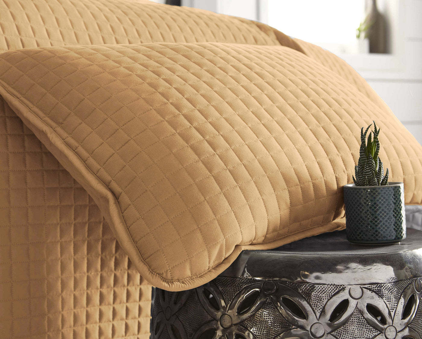 Close Up View of Vilano Oversized Quilt Shams in Gold #color_vilano-gold