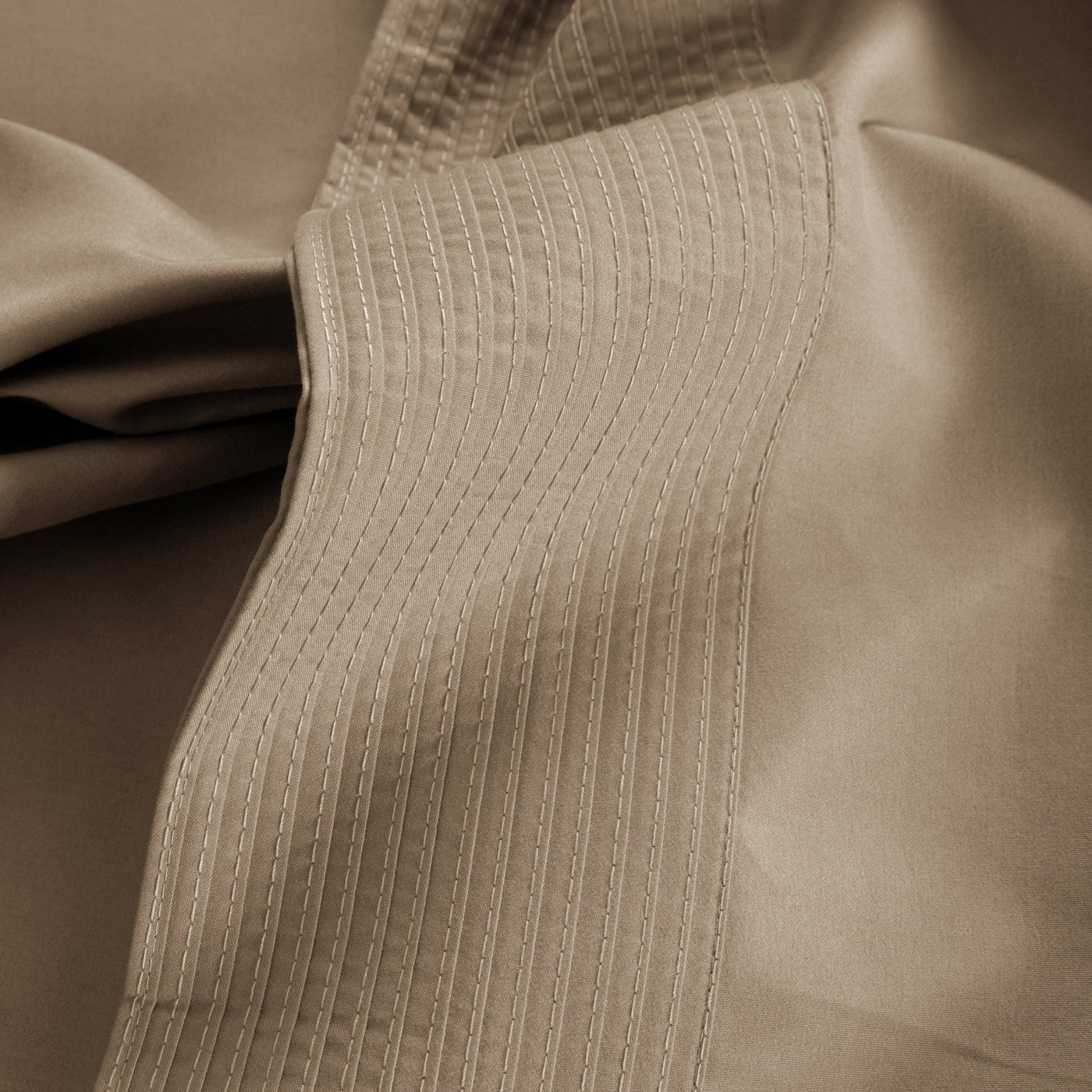 Details of Elegant Pleated Hem of Vilano in Taupe#color_vilano-taupe