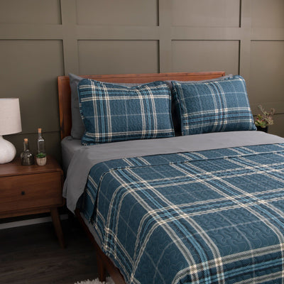Angled View of Vilano Plaid Quilt Set in Blue#color_plaid-blue