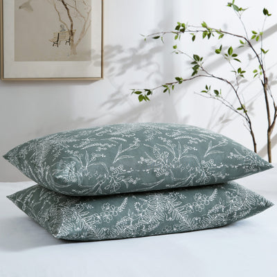 Two Winter Brush Pillowcases in Teal and White Flowers Stack Together#color_winter-brush-teal-with-white-flowers