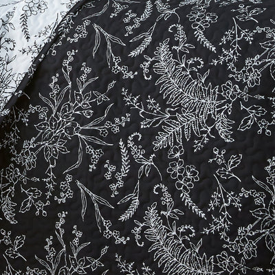 Details and Texture of Winter Brush Reversible Quilt Set in Black#color_winter-brush-black
