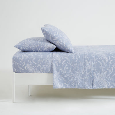 Side View of Winter Brush Sheet Set in Blue and White Flowers#color_winter-brush-blue-with-white-flowers