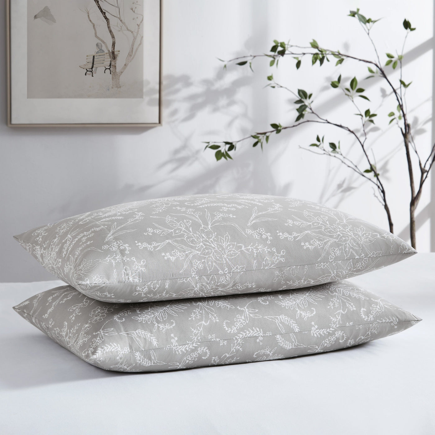 Two Winter Brush Pillowcases in Steel Grey and White Flowers Stack Together#color_winter-brush-steel-gray-with-white-flowers