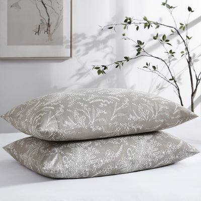 Two Winter Brush Pillowcases in Warm Sand and White Flowers Stack Together#color_winter-brush-warm-sand-with-white-flowers