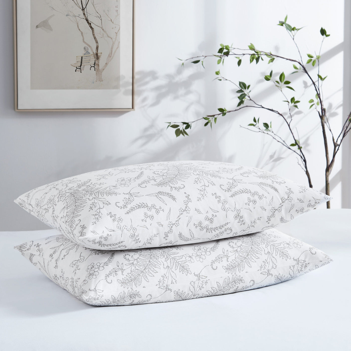 Two Winter Brush Pillowcases in White and Steel Grey Flowers Stack Together#color_winter-brush-white-with-steel-gray-flowers